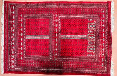 Tapis en laine polychrome rouge à décor de caissons géométri…