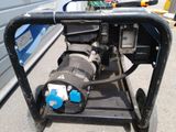 an image of a pump on a cart in a parking lot