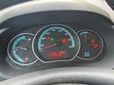 a close up of a car dashboard with a speedometer