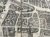an old map of a city with lots of buildings on it