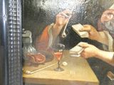 une peinture représentant un homme et une femme assis à une table