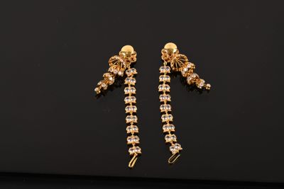 Paire de clous d'oreilles en or jaune 750/1000 - Élégance intemporelle