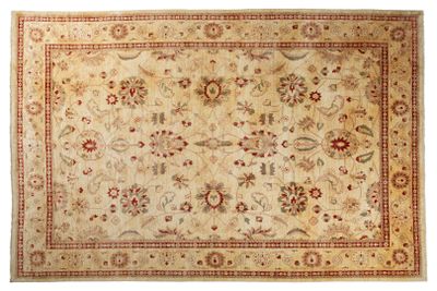 a beige rug with a red border and a floral design