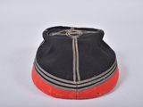 a black hat with a red stripe on it