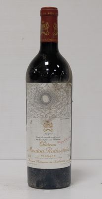 a bottle of wine that is sitting on a table