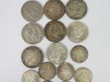 a lot of coins that are on the table
