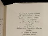 an open book with a picture of a clock on it