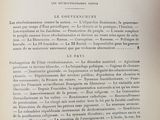 an open book with a black and white image of a table