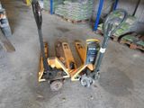a small hand truck that is sitting next to a pile of pallets