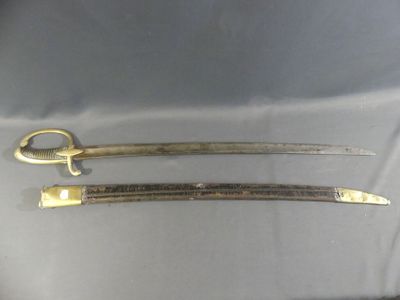 pair of gold - plated swords from the late 19th century