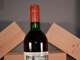 a bottle of wine that is sitting on a table