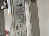 a ladder that has some stickers on the side of it