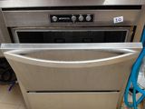 a stainless steel dishwasher that is in a kitchen