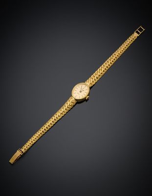 une montre-bracelet en or 18 carats, signée Cartier