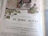 un livre ouvert sur lequel figure l'image d'un homme et d'un chat