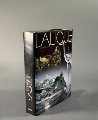 the front cover of a book with a glass of wine on it