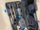a tool kit that is sitting on the floor