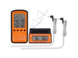 an orange digital thermometer with two probes and a cable