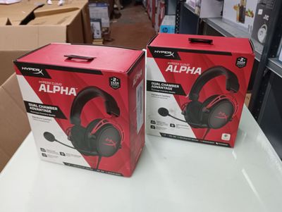 two boxes of headphones are sitting on a table in a store