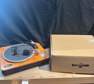 a box with a record player and a box with a record on it