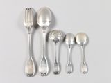 five spoons and two spoons sitting next to each other