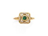 une bague en émeraude et diamant