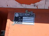 a sign on the side of a building that says fella werkee