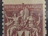 a stamp with a picture of a woman holding a flag on it
