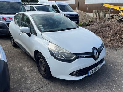 a white car that is parked in the parking lot