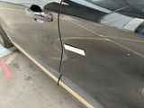 a car that has a sticker on the side of it