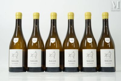 six bottles of wine are lined up on a table
