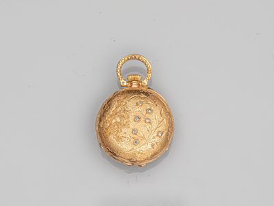 an image of a gold pocket watch with a chain around it