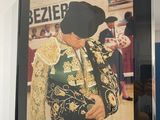 a picture of a man in a bull suit on the wall