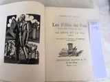 an open book with a picture of a man in a suit on it