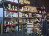many boxes and boxes on the shelves in the warehouse