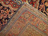 an image of a close up of a rug on a wooden floor