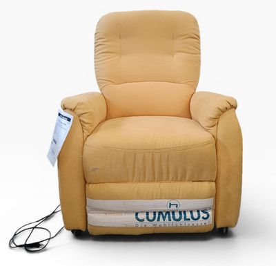 an image of a recliner chair with a remote control on it