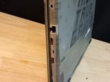a laptop that is sitting on a wooden table