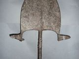 an image of a metal object on a white surface
