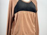an image of a mannequin mannequin wearing a brown and black top