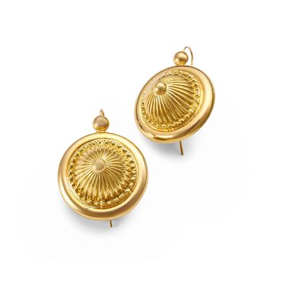 an image of a pair of gold earrings on a white background