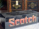 a black box sitting on top of a marble table