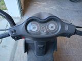 a close up of a motorcycle with a speedometer and gauges