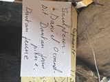 a piece of paper with a note attached to it