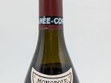 a bottle of wine that is sitting on a table