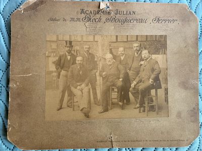 an old photo of a group of men posing for a picture