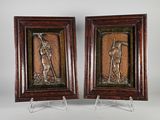 une paire de bas-reliefs en bronze représentant un homme et une femme