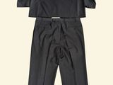 an image of a black suit and pants on a white background