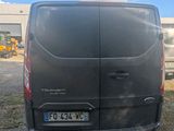 a black van that is parked in the parking lot