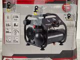 an image of a box with a black compressor on top of it